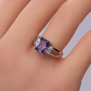 Amethyst with silver and CZ on side.